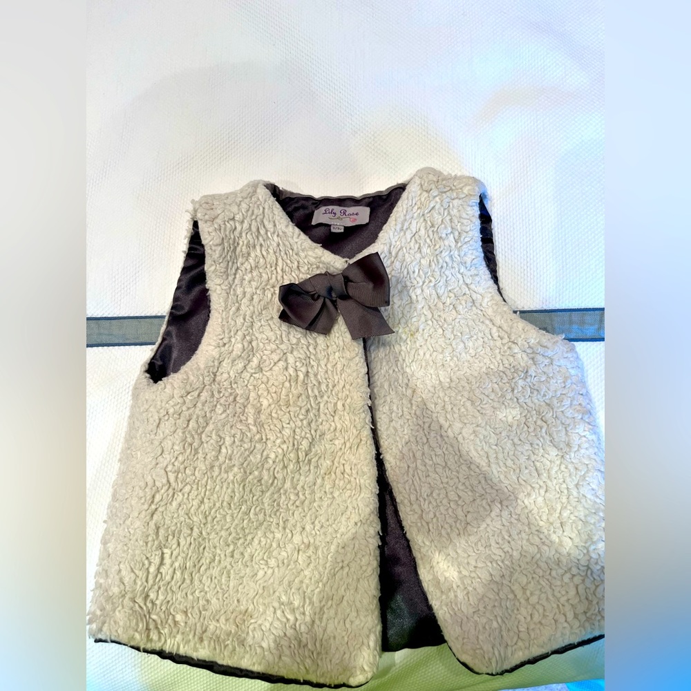 Trotters of London brand “Lily Rose” faux shearling/Sherpa vest, size 2/3